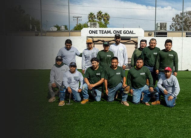 The HaloTurf installation crew on a finished turf field